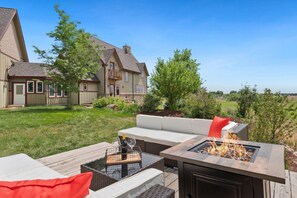 Outdoor Lounge Area with Fire Pit and Mountain Views