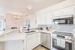Spacious, beautifully designed kitchen equipped with everything you need for vacation cooking