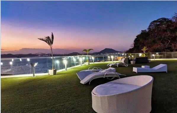 Ample Sunset Terrace by pools deck ' 
