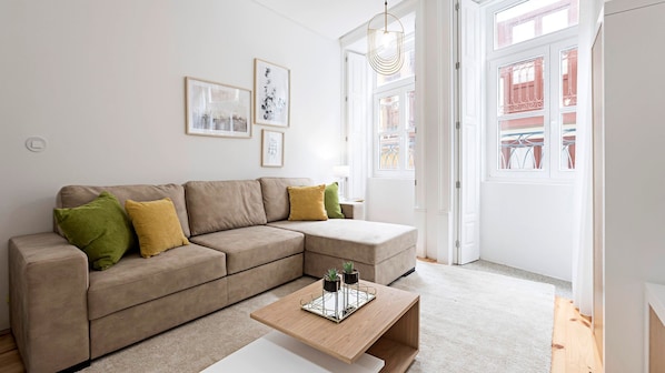 Bright living area with a TV