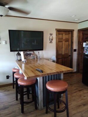 Kitchen with large screen smart tv