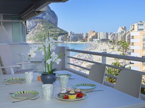 Sky, Table, Building, Property, Furniture, Flowerpot, Water, Tableware, Chair, Azure