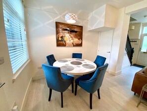 Open living/dining room, where you can eat or watch tv in the spacious area. 