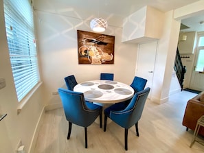 Open living/dining room, where you can eat or watch tv in the spacious area.