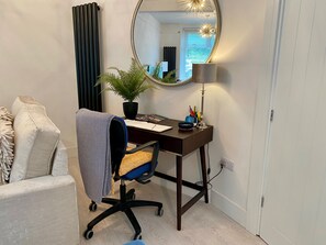 Work desk in the open living/dining area with super fast wi-fi. 