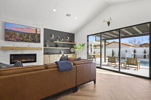 Main living area with floor-to-ceiling sliding glass doors!