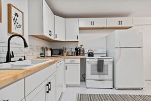 Pristine and white kitchen!