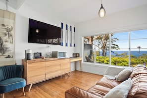 TV Cabinet and Kitchenette.