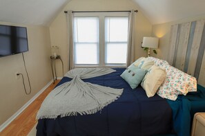 Second Bedroom with Queen bed, TV hung on wall