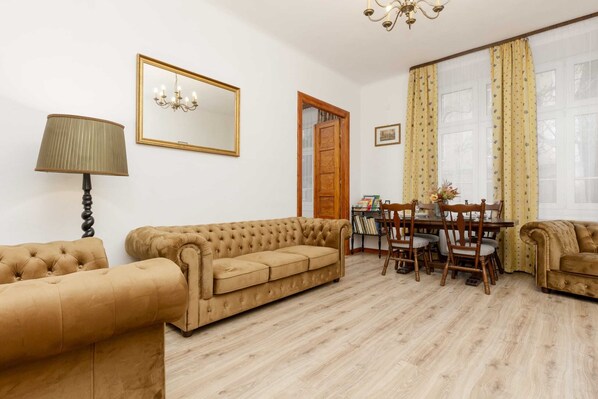Living room with a comfortable sofa and TV. 