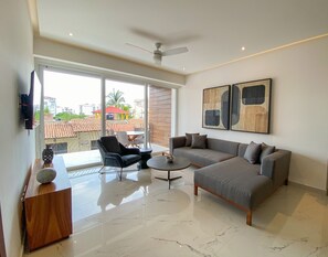 Spacious living room area with extended balcony