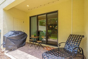 Outdoor Patio with Dining Area for 2, Sunbed, and Grill at your Disposal!

