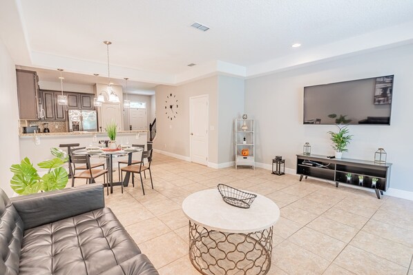 Spacious Living Room with Big TV at Your Convenience!
