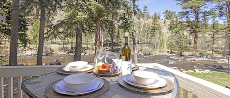 Enjoy the Big Thompson River views from the outdoor patio