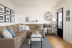 Living area and front entry off of main deck.