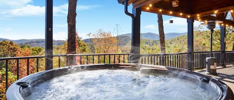 New hot tub with breathtaking mountain views in the background! 