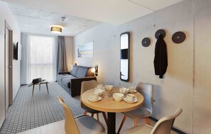 Sink into the cozy sofa after a day exploring the area.