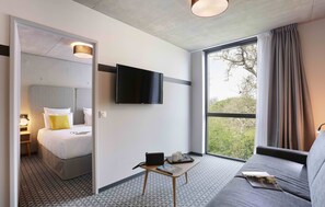 Relax on the comfy bed after a day outside.