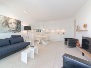 Furniture, Couch, Table, Picture Frame, Comfort, Living Room, Studio Couch, Flooring, Floor
