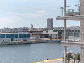 Water, Sky, Building, Cloud, Body Of Water, Lake, Tower Block, City, Waterway, House