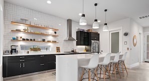 Whisked away by sleek style and breakfast bar charm!