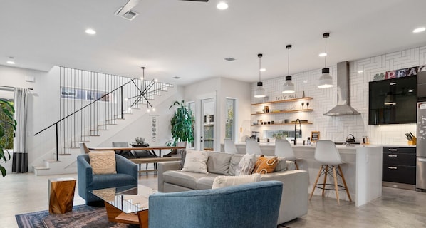 From couch to kitchen—this space really knows how to serve looks!