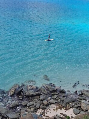 Enjoy paddle boarding in front of Sailfish Villa 
