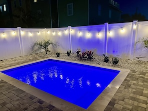 Private heated saltwater pool (night view)