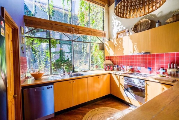 Kitchen Area - Fully equipped with dishwasher,microwave and full sized fridge/freezer