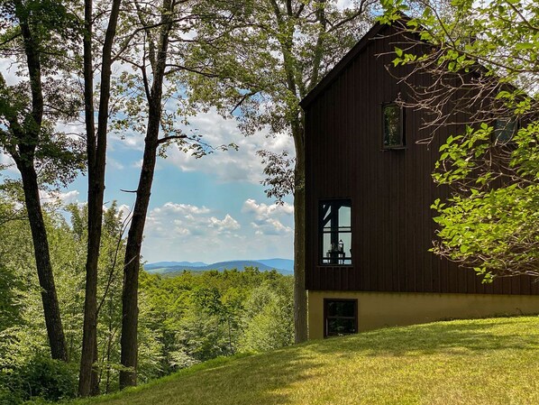 Our peaceful home, with stunning view of the Hudson Highlands, and refreshing pool.