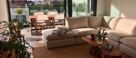 View of living room open onto balcony.