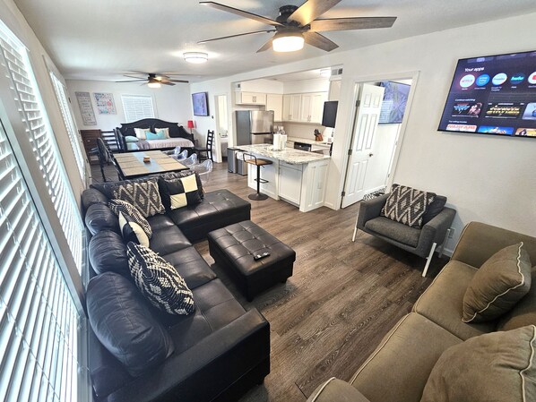 Lots of seating. Sectional sofa, queen sofa bed, chair.
