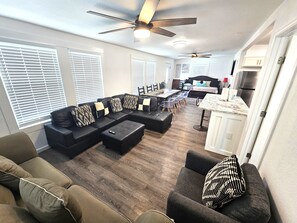 Two separate living areas with their own separate smart TVs.