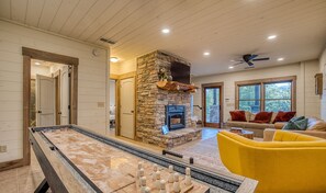 The lower level game room is the best place to hang out in on those rainy days!