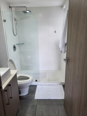 Both baths have standup showers and are fully stocked.