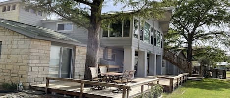 Windows galore and a huge deck to enjoy the lake views.