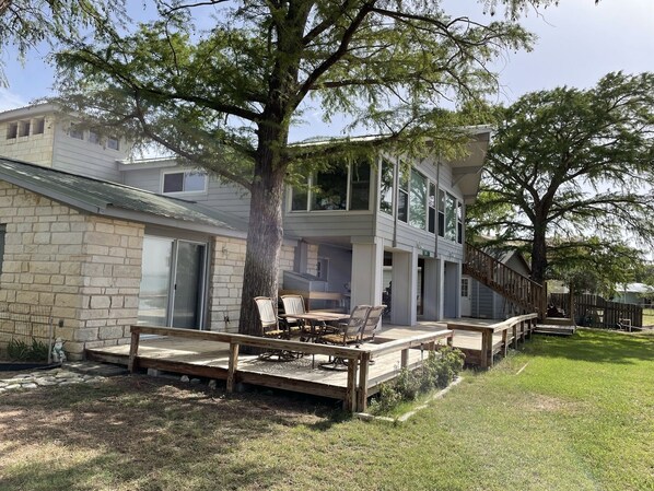 Windows galore and a huge deck to enjoy the lake views.