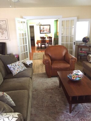 Very spacious living room, then dining room.  Amazing light!