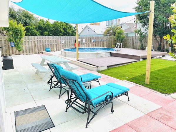 Private Outdoor Pool w/ lounge chairs, picnic table seating area and BBQ 