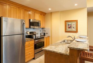 Curb your appetite by cooking a meal in your kitchen.