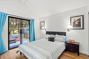 Main bedroom is at the back of the house & has a TV and a Blu-ray player.