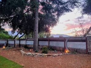 front yard w pink moment and Topa Topa views. Fully fenced and gated