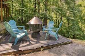 Outdoor fire-pit right next to the grill for entertaining outside!