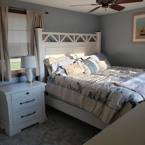 Main bedroom with huge, comfy king sized bed and wonderful view