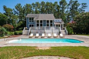 Private salt water pool & view of the back of main house