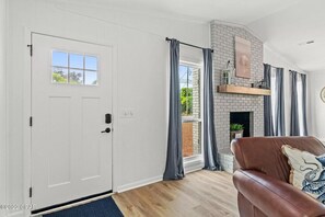 Front door opens up directly into open-concept living area