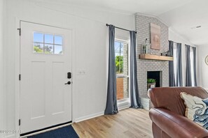 Front door opens up directly into open concept living area