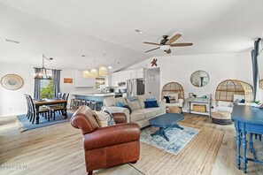 Open-concept living integrates into large dining room and fully stocked kitchen