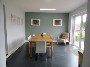 Dining area overlooking patio and garden