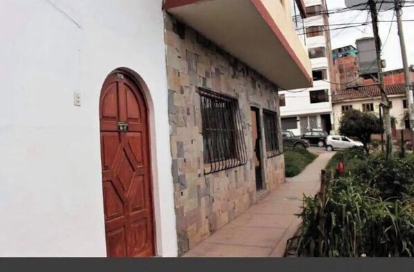 Entry, very close to main road and right across street from garage and park